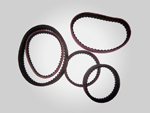 Rubber timing belts for the withdrawal of packaging